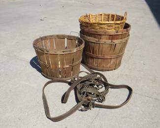 Lot 136. Three old fruit baskets, a wicker basket, and a bridle and bit