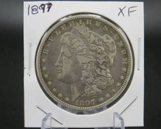 Lot 254. 1897 O Morgan silver dollar
