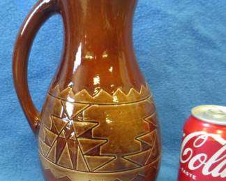 Lot 196. Signed pottery water pitcher from the Sioux Pottery in Rapid City South Dakota. Excellent condition.
