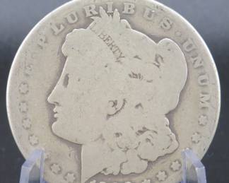 Lot 58. 1900 O Morgan silver dollar