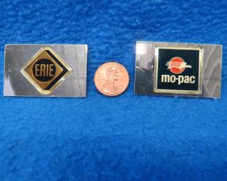 Lot 215. Two sterling silver ingots from "The Great American Railroad Emblems" series. Erie and the Missouri Pacific. Total weight of 45.2 grams.