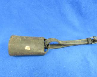 Lot 224. Cow bell with leather strap