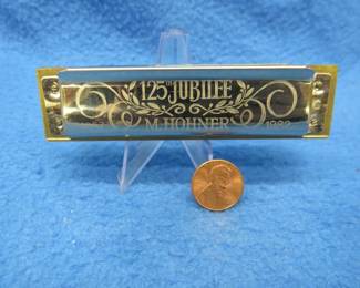 Lot 95. M. Hohner 125th Jubilee 1982 10-hole diatonic harmonica in the box both in excellent condition. Sounds great.