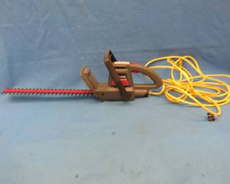 Lot 61. Craftsman Bushwacker 18" electric hedge trimmer. Includes extension cord.