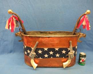 Lot 16. Old copper boiler that was been repurposed as a patriotic Western-themed decorative object