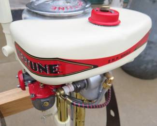 Lot 290. Vintage Neptune 2 HP outboard motor on a stand. Fully restored. Looks like new. Running condition unknown. Model OB11A. S/N G63225