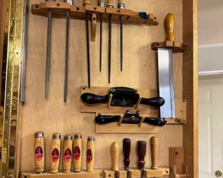 Fine Quality Wall - mounted Woodworking hand tool Cabinet featuring varoius files, Chisels and small saw 
