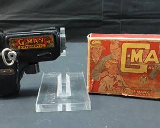 Vtg. G Man Automatic wind up gun Louis Marx and Co. Functional but missing sparkling wheel holder