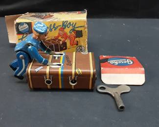 Vtg. Gescha "Express Boy" tin litho windup toy with its original box. Functional with Key