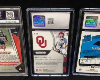 (3) 2020 PANINI PRIZM JALEN HURTS #129 GEM MINT 10, 2018 DONRUSS DJ MOORE #166 GEM MINT 10 & 2017 PANINI PRIZM CHRIS GODWIN #243 MINT 9 FOOTBALL CARDS