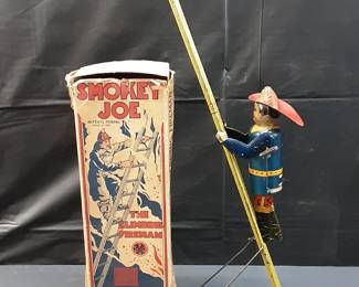 Vtg. Smokey Joe wind up toy Louis Marx and Co. Key winding mechanism working. Great vintage toy with original box