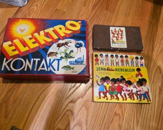 Elektro-Kontakt educational quiz game manufactured by Stockinger & Morsack (Stomo) in Austria andvintage German children's book titled "Zehn kleine Negerlein", published by Pestalozzi Verlag. 