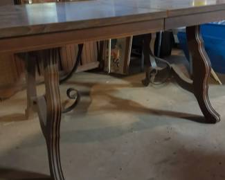 Wooden Dining Table with Iron Accents