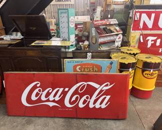 Coca Cola Sleigh and Pennzoil drums, make great trash cans for a shop! Lids easily remove and clean on inside 