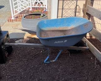 T132 - $50. Jackson Metal Wheelbarrow. Well loved but still lots of loads left in it!
