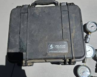 T107 - $220, lot of 8 pressure gauges (30, 60, 100, 160, 1000, and 5000 psi) in a Pelican 1400 Case
