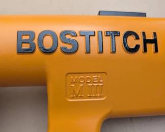 T21 - $175. Bostitch Model Miii Hardwood Flooring Stapler with BucketBoss Bag. 