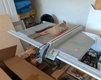 T37 - $225. Hitachi C10FL Table Saw. On a rolling homemade base. 