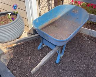 T132 - $50. Jackson Metal Wheelbarrow. Well loved but still lots of loads left in it!
