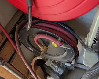 T73 - $30. Retractable Air hose Reel. 