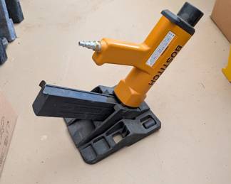 T21 - $175. Bostitch Model Miii Hardwood Flooring Stapler with BucketBoss Bag. 