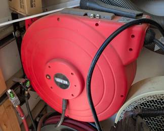 T72 - $40. Ironton 65' 12-3 gauge Retractable Cord Reel with Triple Tap. 