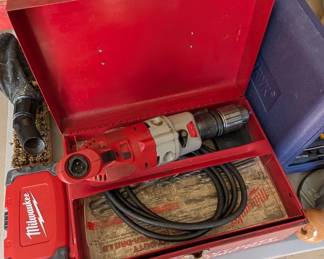 T50 - $75. Milwaukee Magnum Hammer Drill. Model #5370-1. In metal case. Tested & Works. 