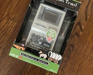 NIB Oregon Trail pocket game 