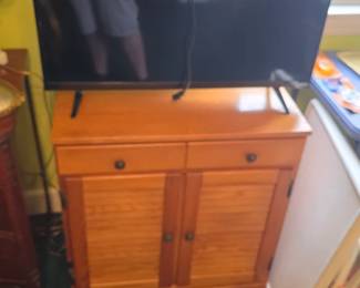 flatscreen and cabinet 