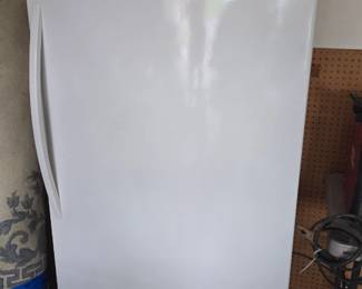 Whirlpool Upright freezer. Works great, comes with lock in key.