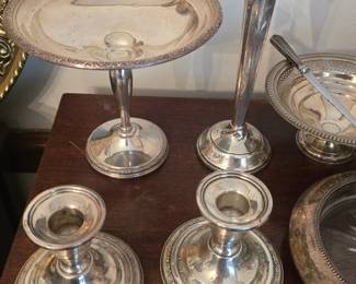 Sterling silver candle holders and more.