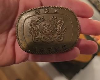 Vintage belt buckle diving.