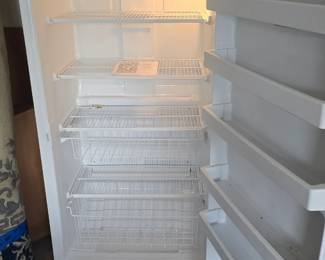 Whirlpool Upright freezer. Works great, comes with lock in key.