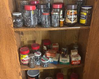 nuts bolts screws hardware in cool old advertising coffee jars 