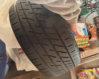 set of four run-flat tires that came off of a bmw 