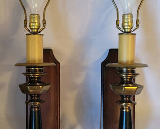 Lot 70: Vintage Pair of French Empire-style brass/black column candlestick wall hanging lamps