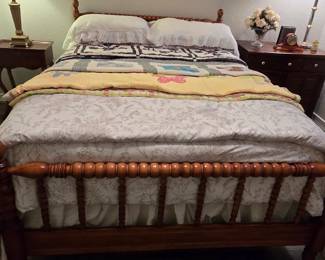 Vintage spindle bed with headboard, footboard, bed frame, mattress and box spring, pictured with Ethan Allen nightstand
