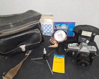 Mamiya/Sekor camera set includes small table-top tripod, flash lamp, camera flash, leather camera case, leather camera bag and instruction booklets
