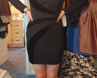 Willow modeling a vintage black mini dress with velvet accents