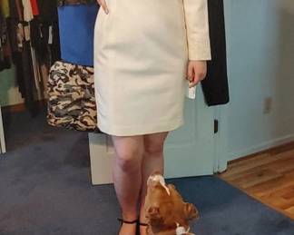 Precious won't leave Morgan alon she models a white polyester dress was sparkly neckline and wristbands e