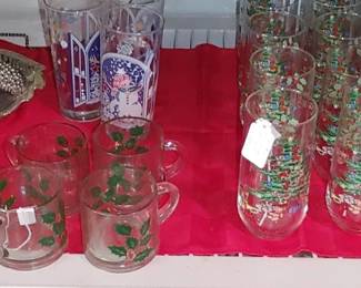 vintage Luminarc Noel Christmas Tree tumblers featuring a decorated tree on one side and a holly sprig on the other