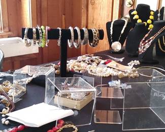 So much great jewelry lots of leftover inventory from the dress shop