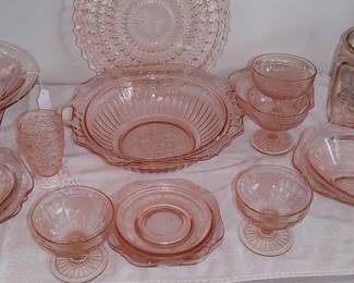 Beautiful collection of authentic pink depression glass and many patterns