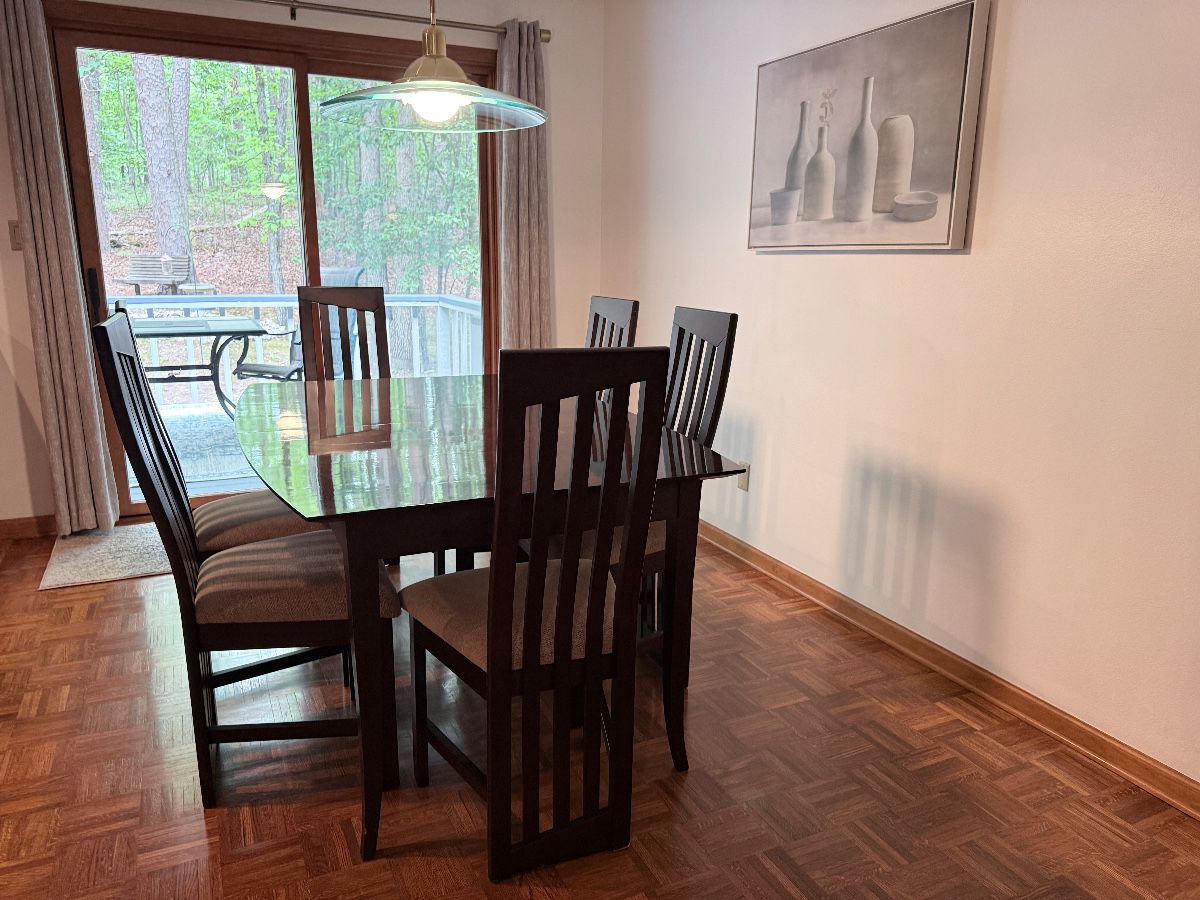 Ebony dining table 6 chairs