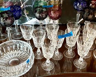 Waterford wine glasses. Candlestick holders, serving bowls; multicolored carved wine glasses 