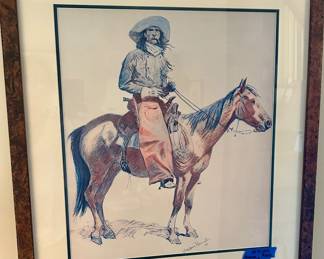 Arizona Cowboy by Frederick Remington “Arizona Cowboy” signed 25”w x 27.5”h  $250