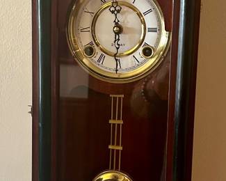 Battery operated, 26”h wall clock $40
