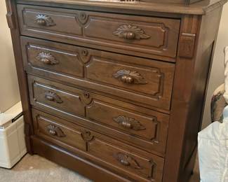Antique carved dark wood 4 drawer carved wood handled dresser  w/ mini side drawer on top 40”w x 18”d x48” h $450