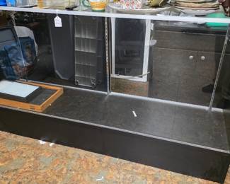 black showcase with 2 glass shelves $150
