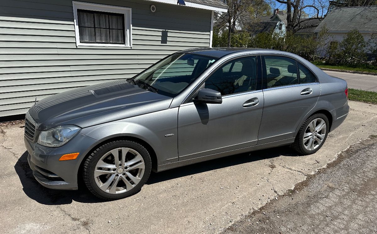 2012 Mercedes C250; grey; 4-door; 43,603 miles; rear camera navigation; heated seats; Harmon Karden stereo; memory seats: $11,000